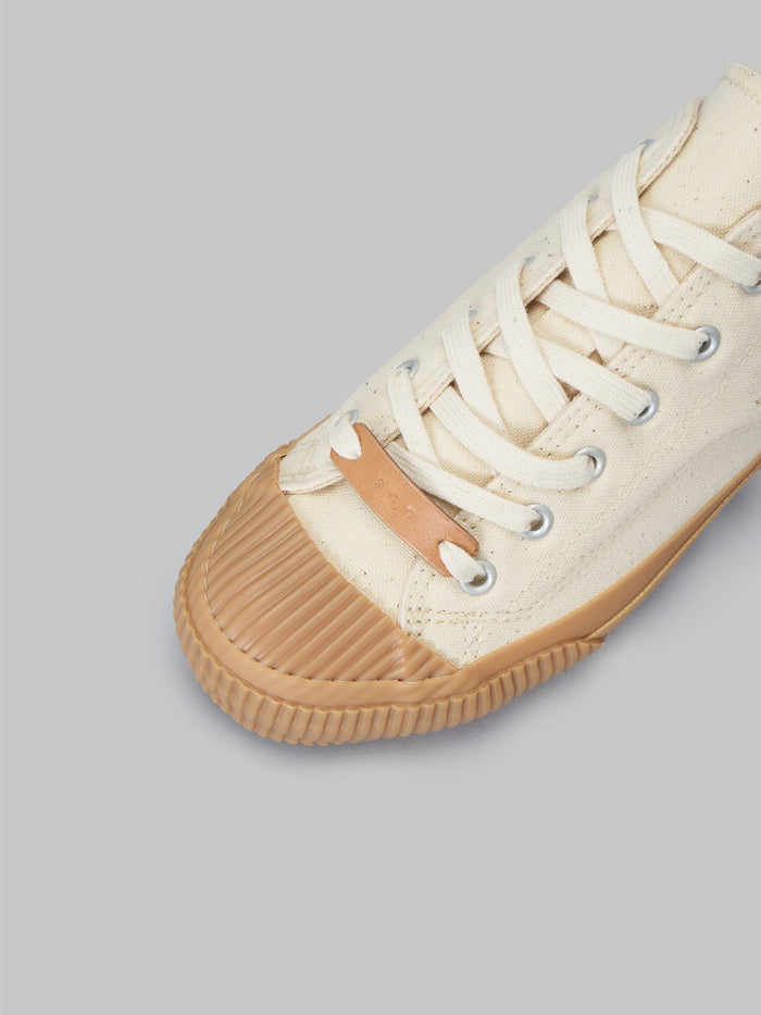 pras sellcap low leather pull strap kinari gum sneakers toe