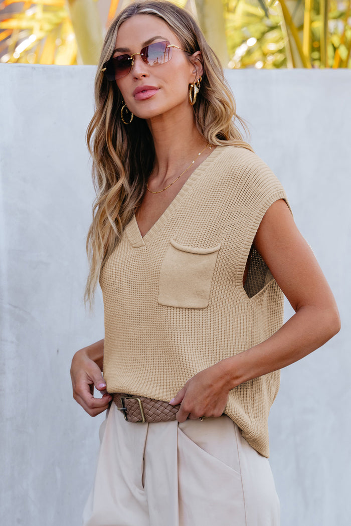 Pull côtelé à manches courtes et poche poitrine abricot