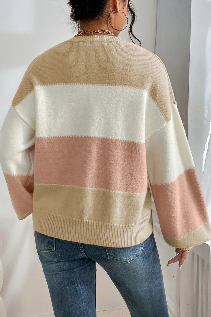 Pull rose poudré à manches lanternes *
