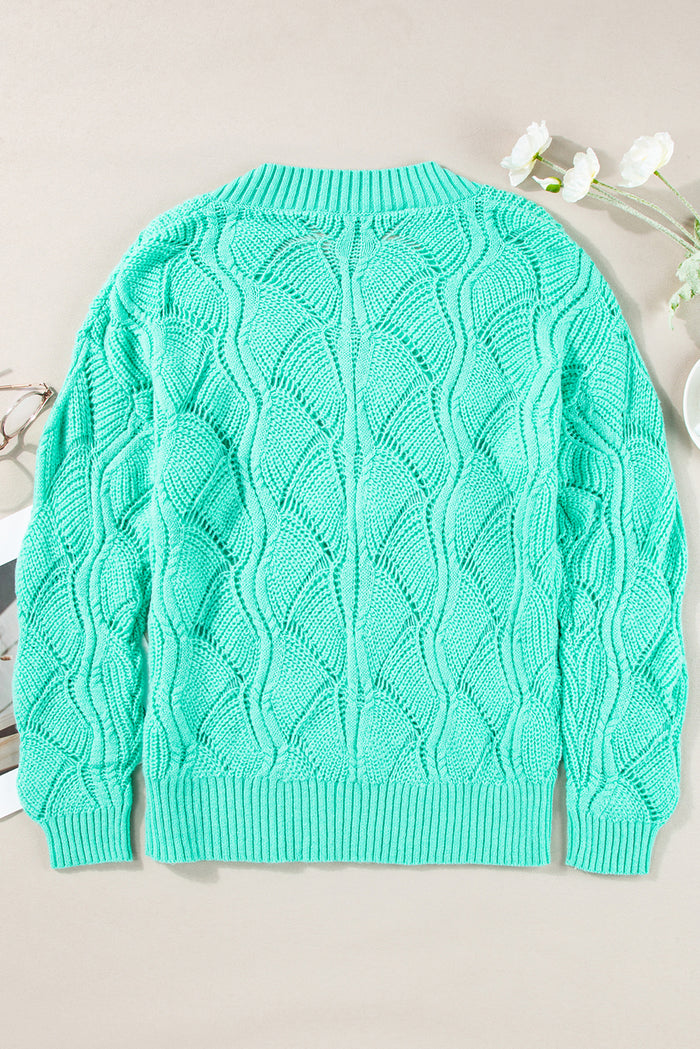 Pull vert menthe en tricot ajouré à col en V *