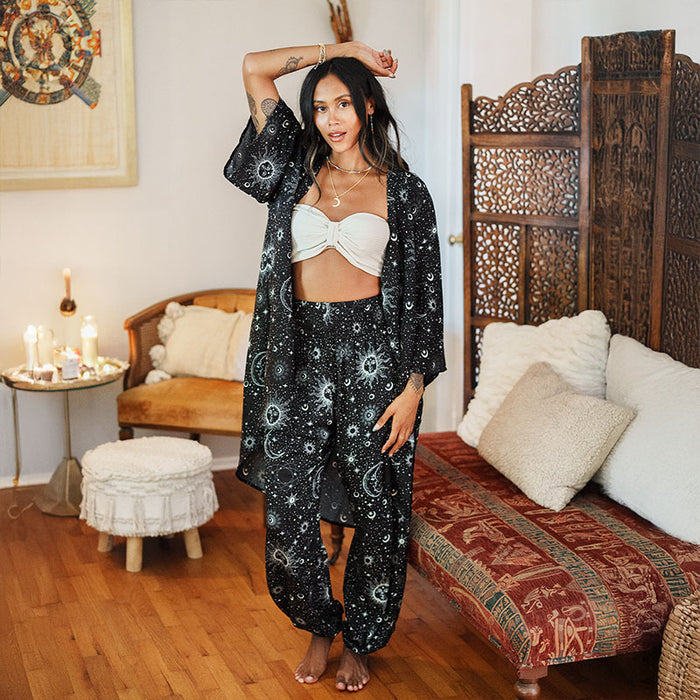 Raven Cosmic Sky Cover Up, front, arms raised
