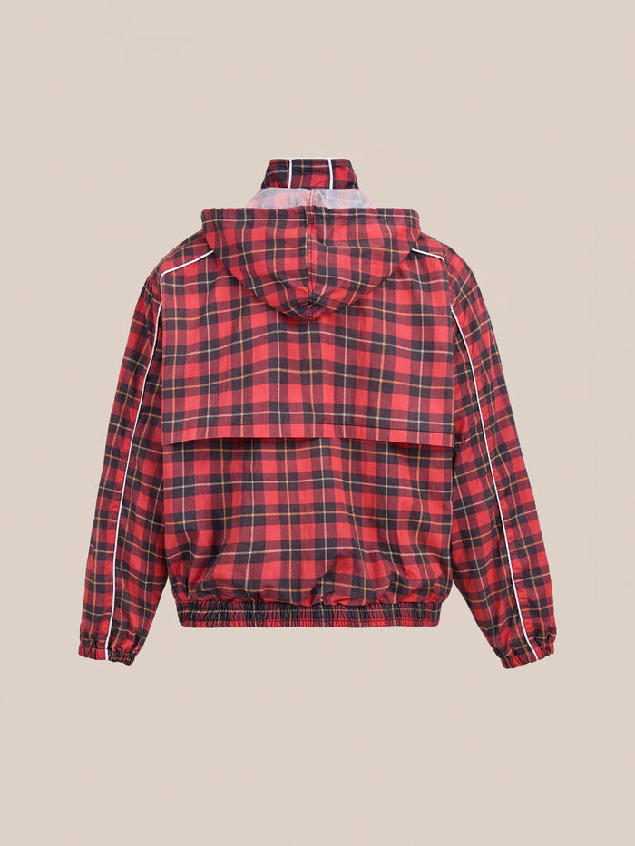 The FOUND Red Plaid Track Jacket showcases a red and black plaid design with a hood, elastic cuffs and hem, plus white sleeve piping, displayed from the back against a plain background.