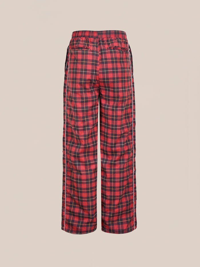 Back view of Found Red Plaid Track Pants featuring an elastic waistband and relaxed fit, shown against a plain light background.