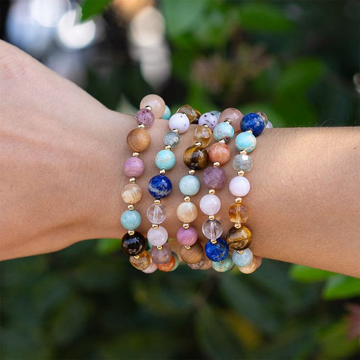 Renew Statement Healing Bracelet, stacked on wrist with greenery