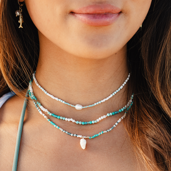 Ride The Wave 3mm Healing Necklace, layered on the neck