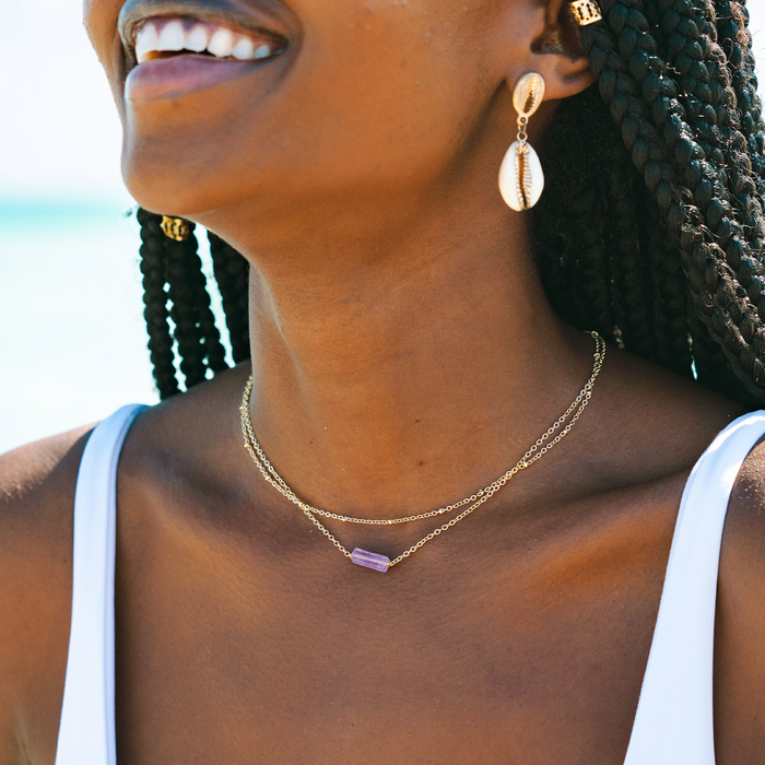 Ring of Fire Gold Necklace, worn on the beach