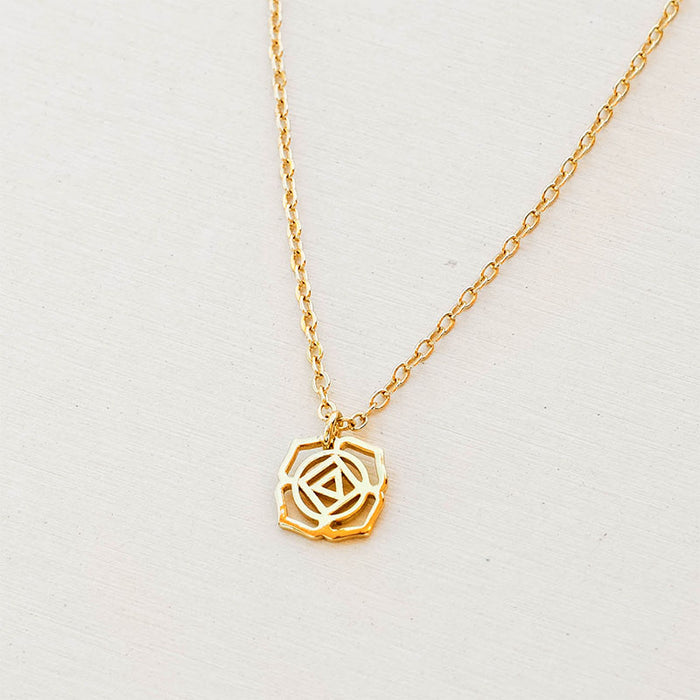 Root Chakra Necklace, flat lay gold chain