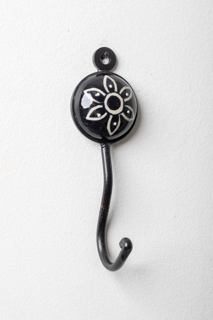 Round ceramic tile hook in black floral