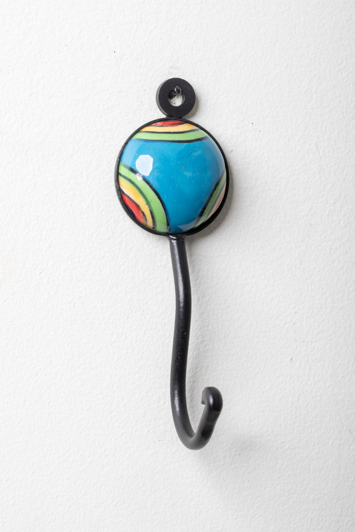Round ceramic tile hook in rainbow