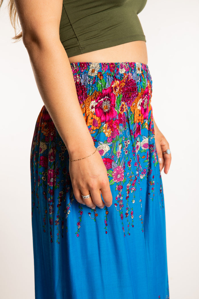 Sophie is wearing floral palazzo pants in sky blue