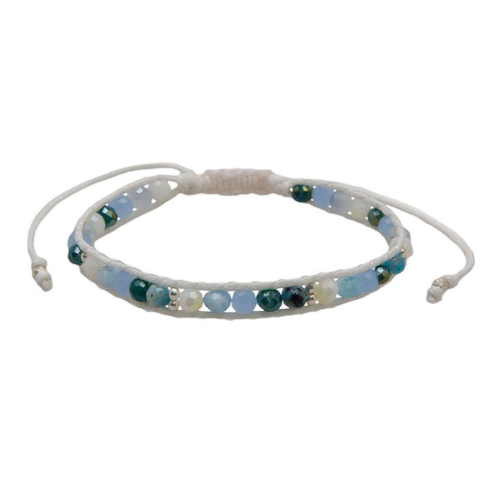 Sapphire Surf Healing Bracelet, flat lay white cord