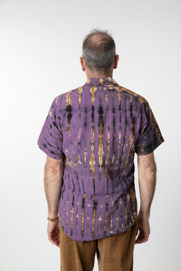 Ross is wearing size M cotton tie dye button up shirt in purple