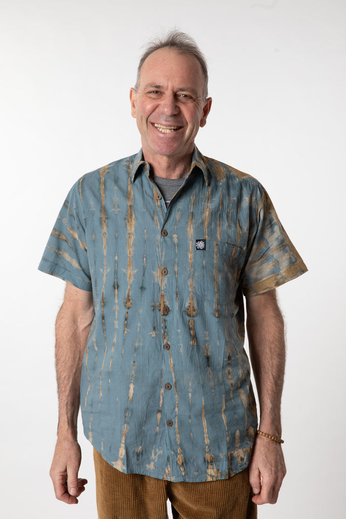 Ross is wearing size M cotton tie dye button up shirt in slate