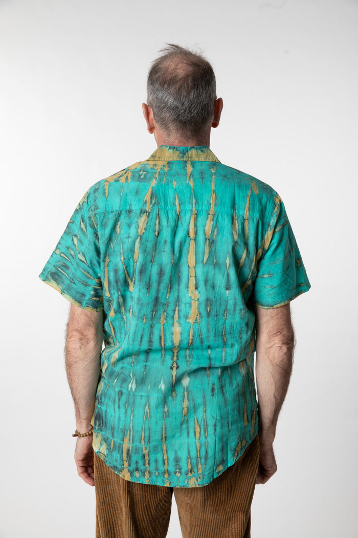 Ross is wearing size M cotton tie dye button up shirt in turquoise