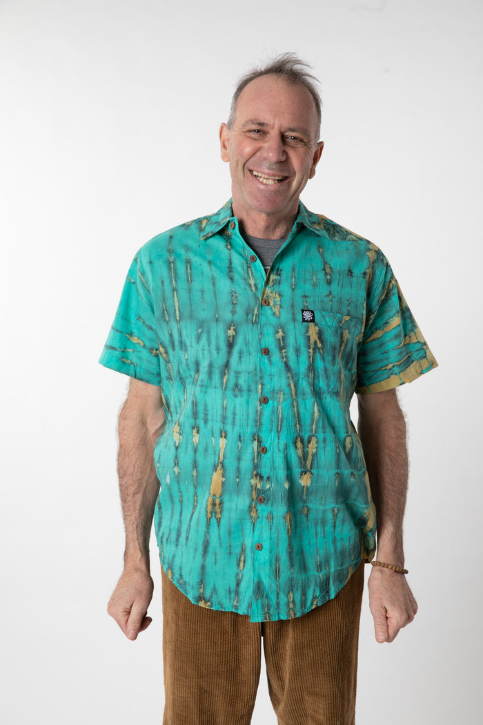 Ross is wearing size M cotton tie dye button up shirt in turquoise
