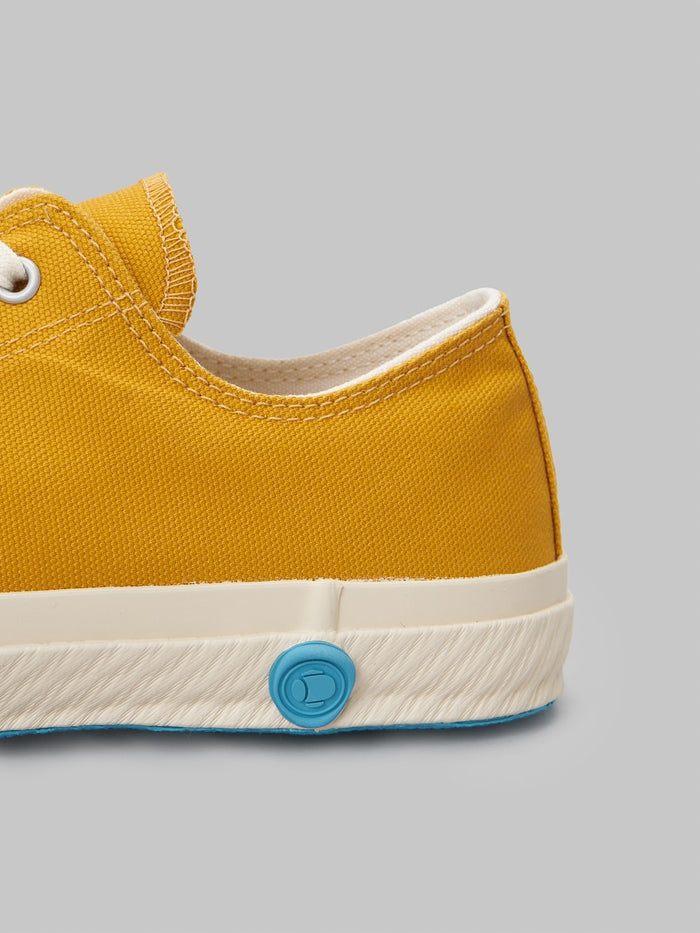 Shoes like pottery low mustard sneakers brand logo stamped