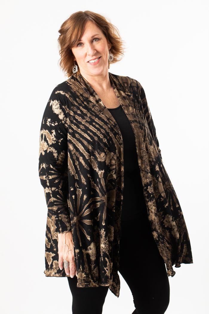 Betty wearing a black and white mudmee tie dye cardigan