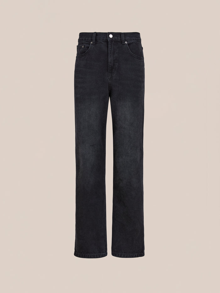 Found’s Straight Leg Jeans, featuring a high-waisted black cotton denim design, are displayed against a light beige background.