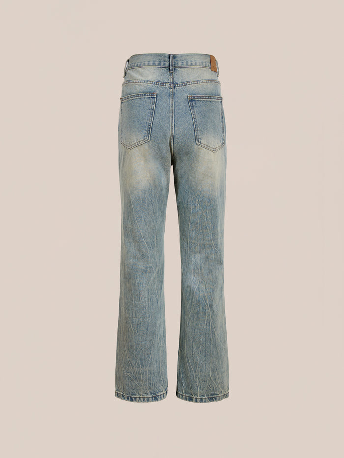 The Found Straight Leg Jeans feature a classic back view with two pockets and a subtly faded, worn look highlighted by visible creases.