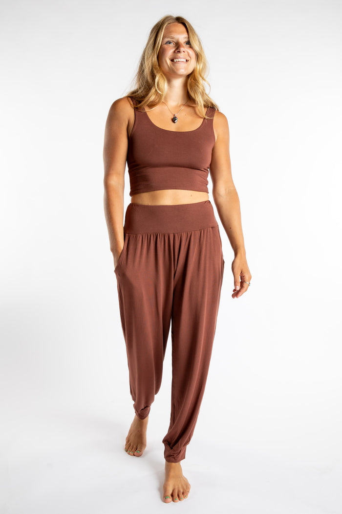 Sophie is wearing the Jum Jum Tapered Joggers in Brown in S/M