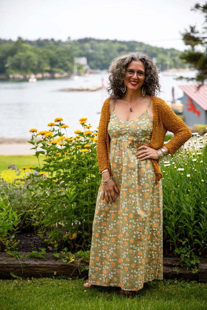 Susan is wearing the Sundara Cotton Maxi Dress in Jade M/L
