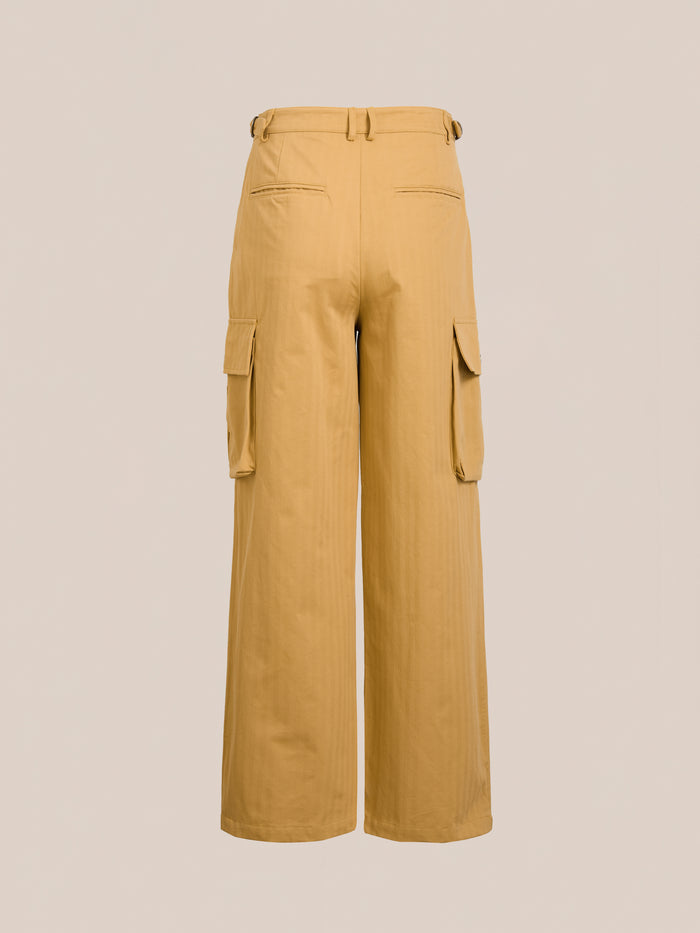 FOUND's Sunlight Twill Cargo Pants are beige wide-leg cargo pants featuring side pockets, displayed against a plain background.