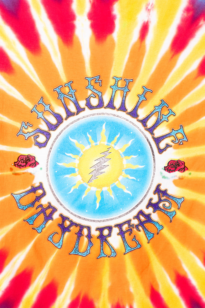 Grateful Dead tie-dye design with 'Sunshine Daydream' text and a sun illustration.