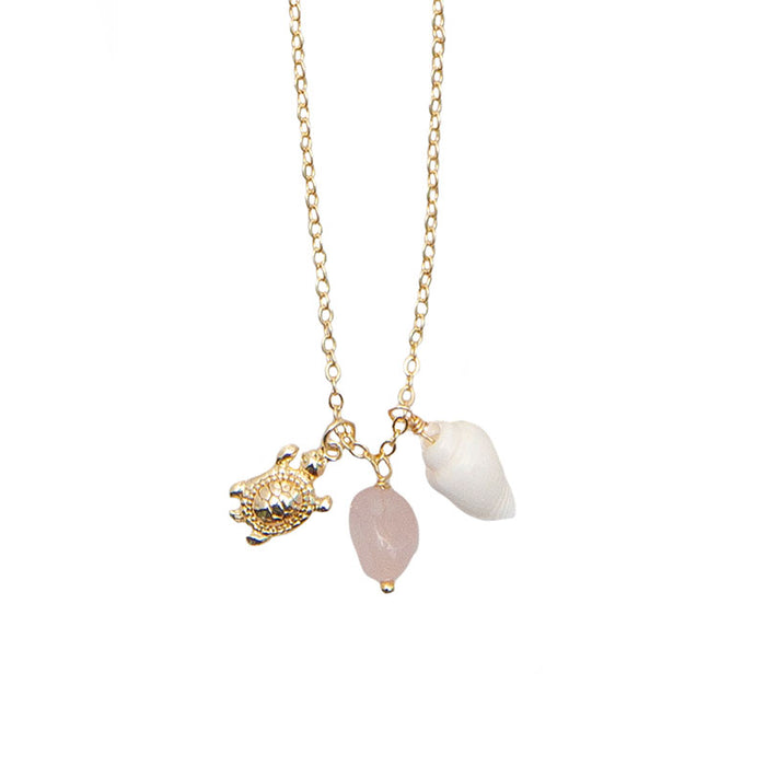 Sunset Snooze Onshore Necklace, flat lay charm detail