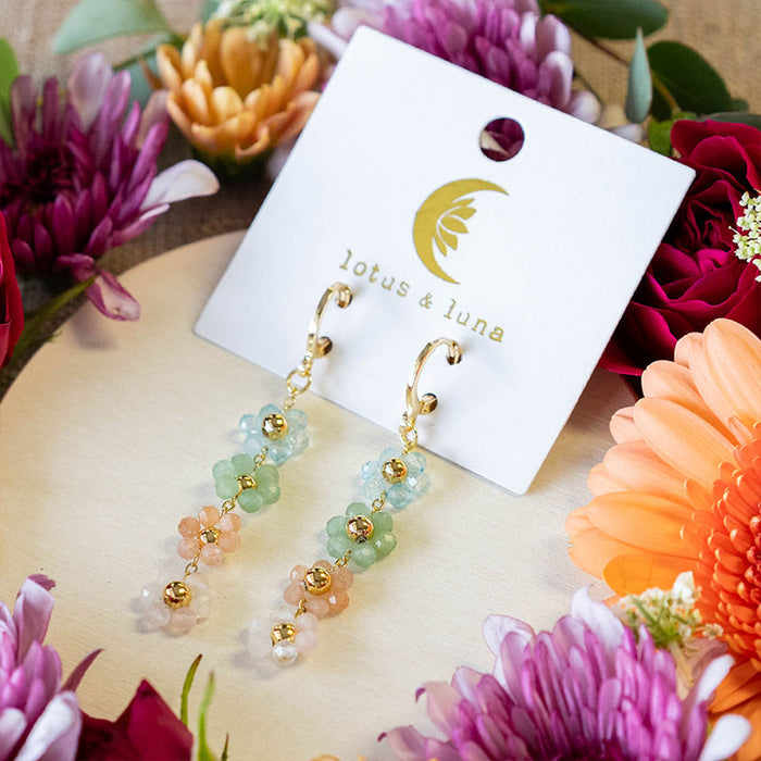 Superbloom Earrings, on brand card with flowers