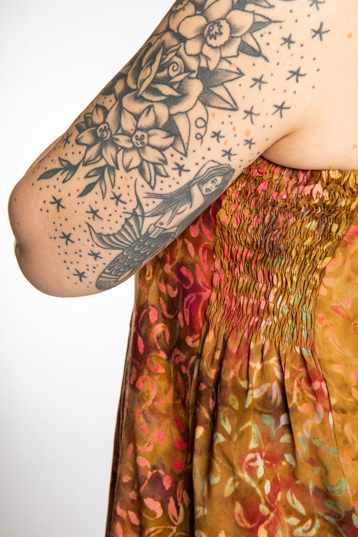 Morgan is wearing the Amber Surya Batik Sundress in size M