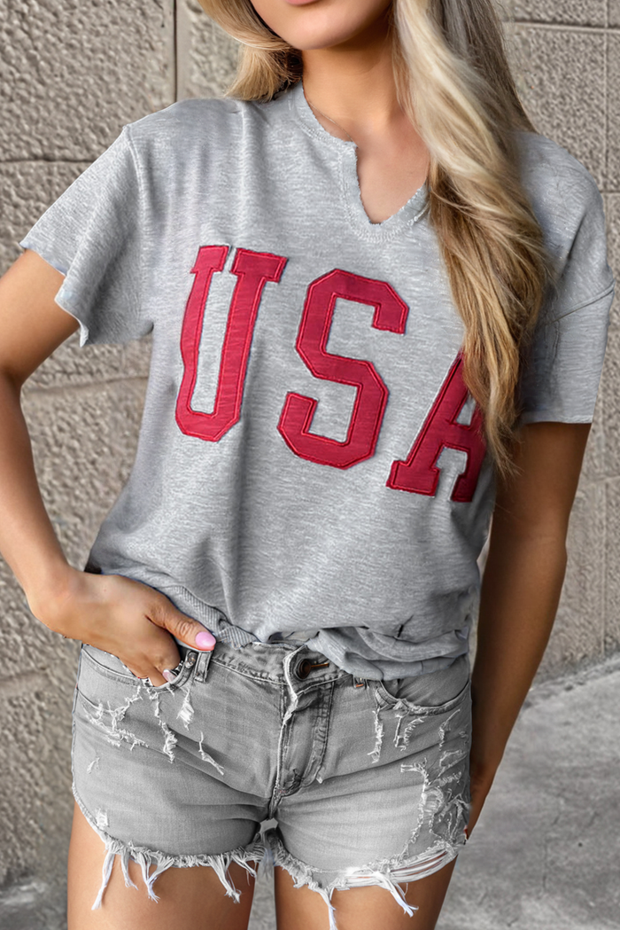 T-shirt ample gris clair avec lettrage USA et col cranté