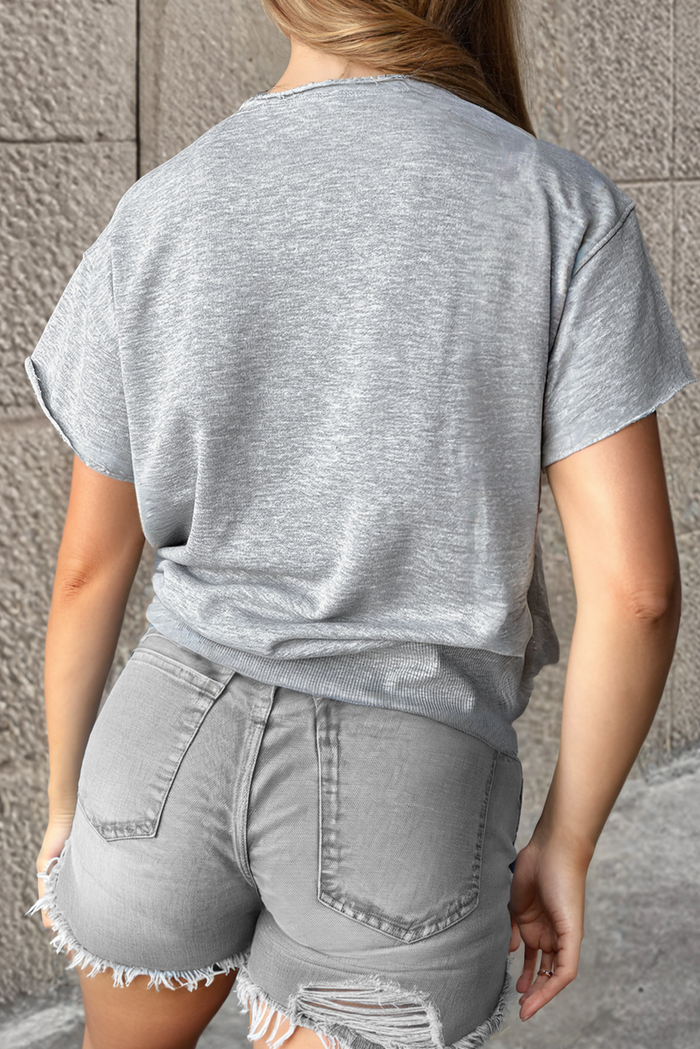 T-shirt ample gris clair avec lettrage USA et col cranté