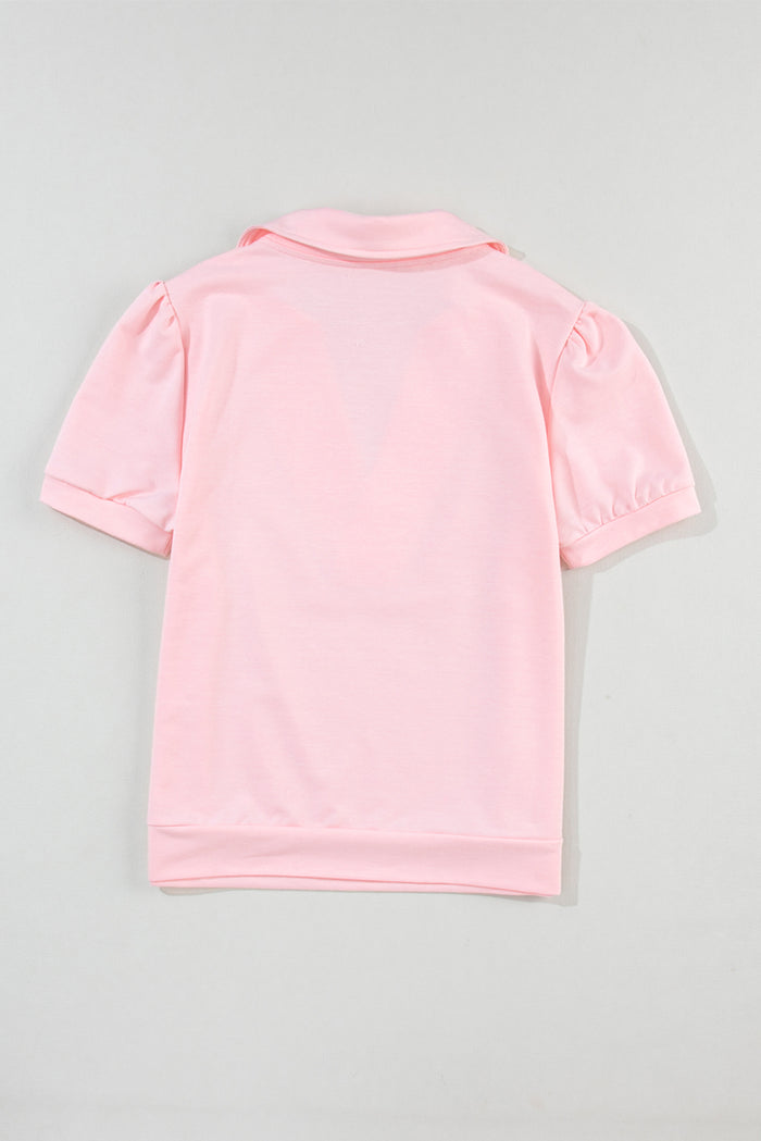 T-shirt rose à col en V et manches bouffantes