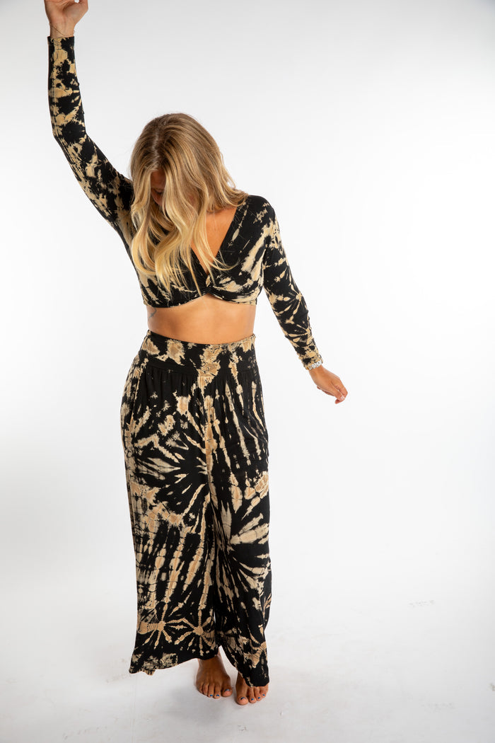 Sophie wearing the s/m tie dye crop top and tie dye wide leg pants in black and white