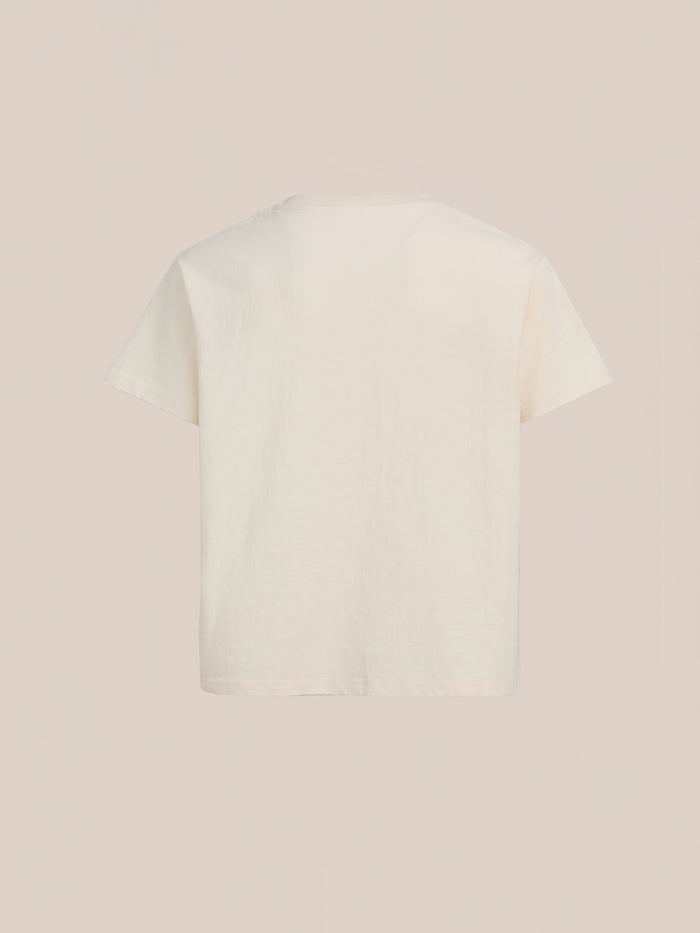 The FOUND Tapestry Logo Paint Tee is shown from the back against a neutral background, featuring a plain white design and crafted from premium cotton for a relaxed fit.