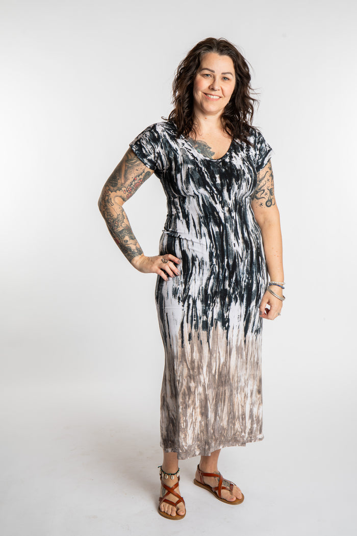 Morgan is wearing the black Tara Tie Dye Maxi Dress in size M