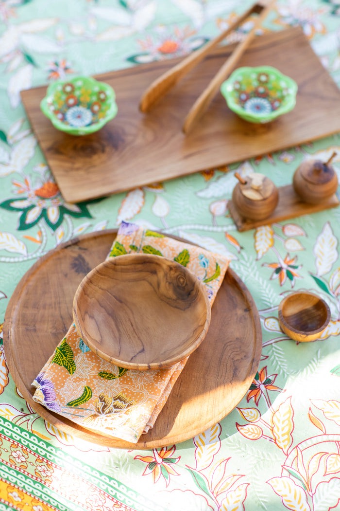 teak wood decor on block print tablecloth