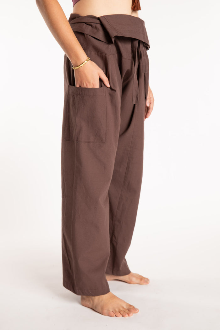 Emily is wearing the Brown Thai Fisherman Pocket Pants
