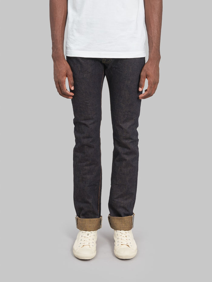 The Strike Gold Brown Weft Slim Tapered Jeans front