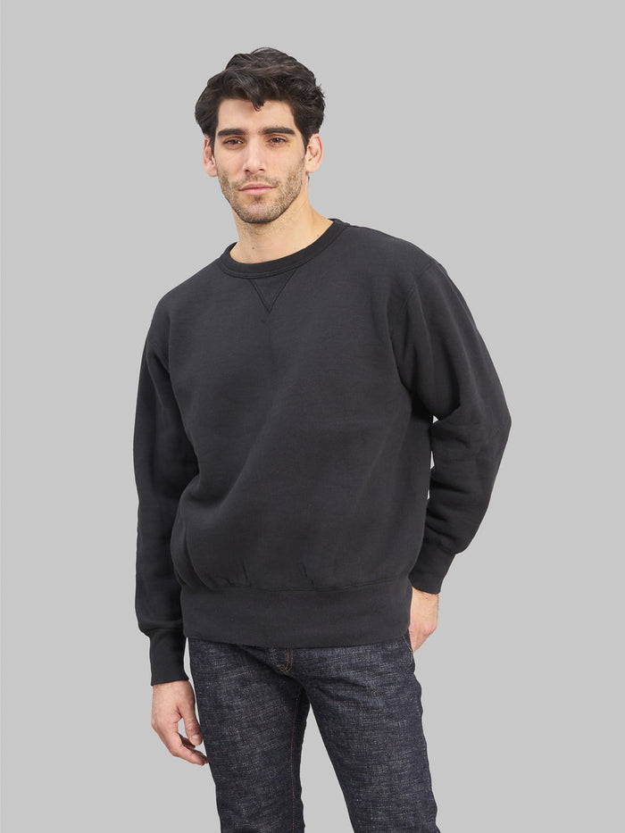 The Strike Gold Loopwheeled Sweatshirt black model front fit