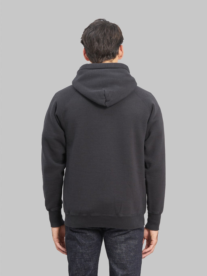 the strike gold zip hoodie black model back fit