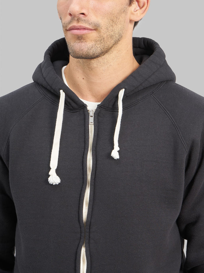 the strike gold zip hoodie black front details