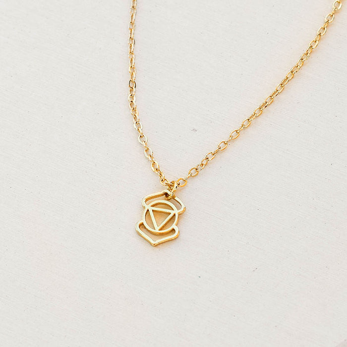 Third Eye Chakra Necklace, flat lay gold chain