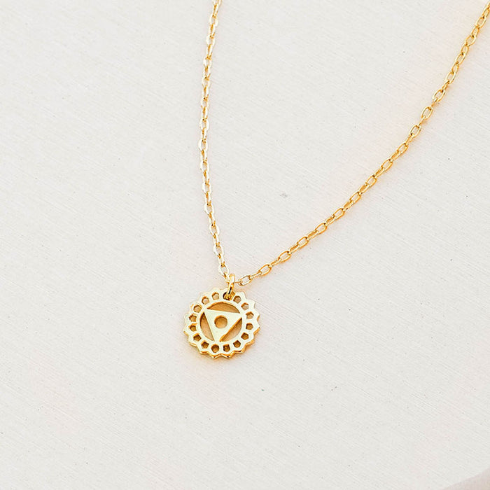 Throat Chakra Necklace, flat lay gold chain