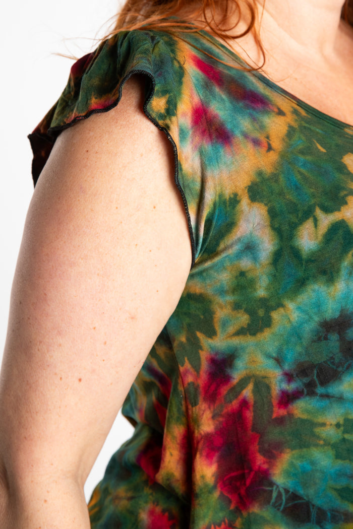 Maggie is wearing the Green Tie Dye Flutter Sleeve Top