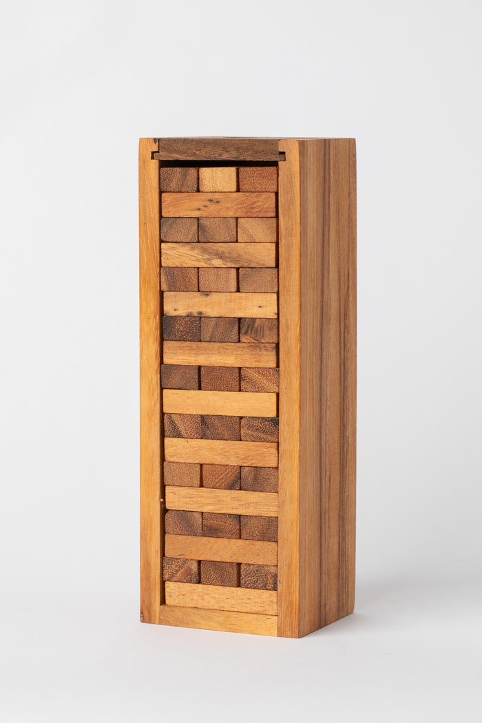 Handmade Timber Tumble wooden stacking game tower made from natural wood — artisan family game from Thailand.