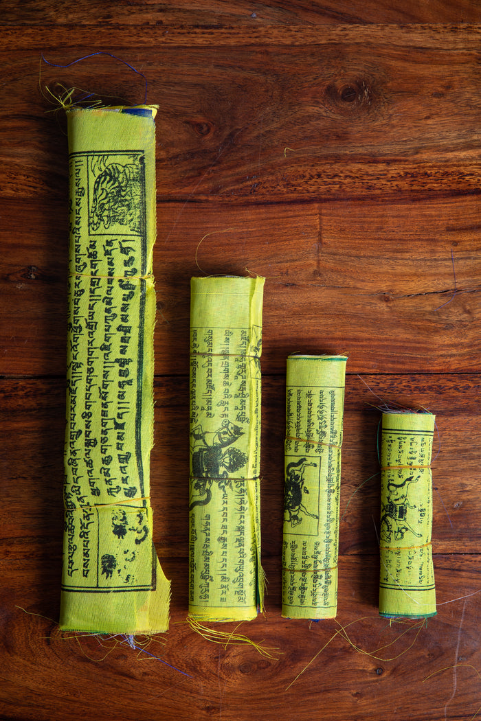 Traditional Tibetan prayer flags in extra small, small, medium, and extra extra large
