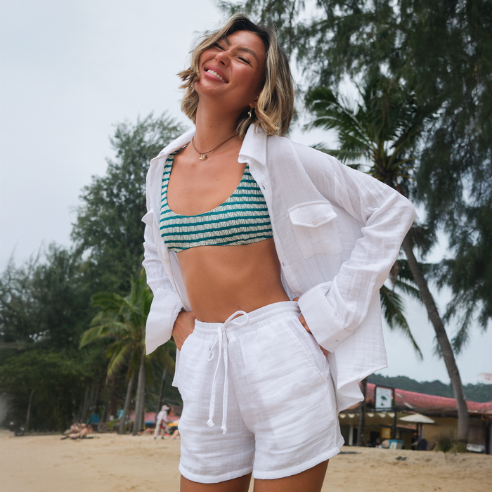 White Cotton Cabana Shorts, worn on the beach in open shirt