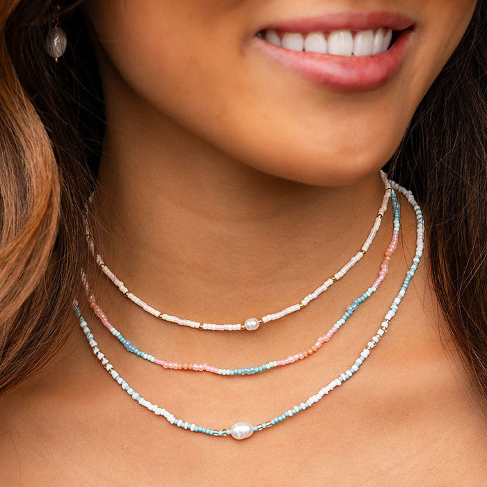 White Sand Beach Seed Bead Necklace, layered at neckline