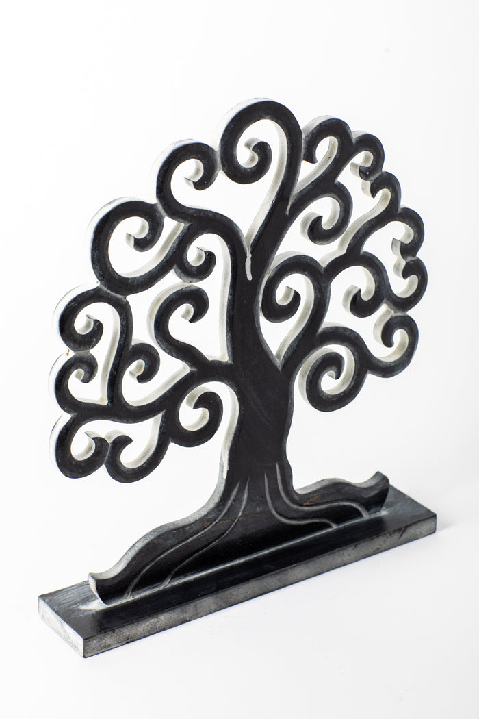 Wooden tree of life sculpture in black